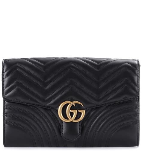 gucci lame leather clutch.